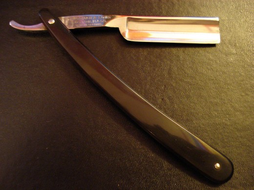 A SUPER-SHARP STRAIGHT RAZOR. THIS IS LIKE KRYPTONITE TO SUPERMAN. THIS DEVICE CAN LEAVE A MAN'S FACE SMOOTH AS A NEWBORN BABY'S BEHIND.