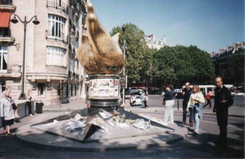 People still pay tribute to the late Princess Diana at the Flamme de la Liberte sculpture, although less than just after her death.