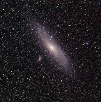 Figure 1. Can you imagine the distance of 2.5 million light-years? The spiral galaxy M31 known as Andromeda on the picture is so away from the Earth. Andromeda is the closest spiral galaxy to the Milky Way.