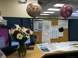 Decorating your work desk with flowers and colours can also improve your mood at work