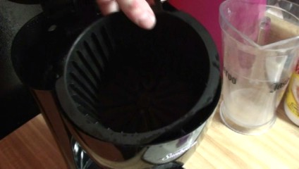 Remove the coffee filter holder from the coffee maker.