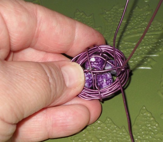 wrap wire under back to secure leaving a large loop