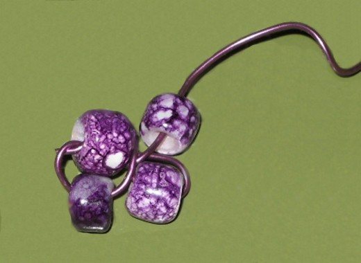 pull beads, fold in half, twist 1 & 4 holding 2 & 3