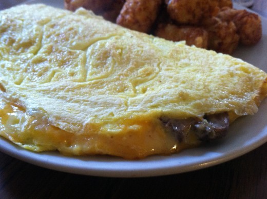 Two egg omelette with spinach, mushrooms & shredded Mexican blend cheese.