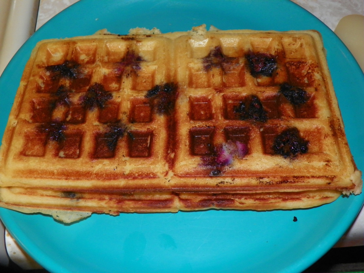 While the waffles are hot the blueberries make them a little fragile so take care working them out of the waffle iron.