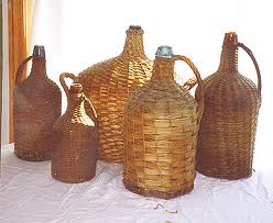 Some demijohns dressed to protect them