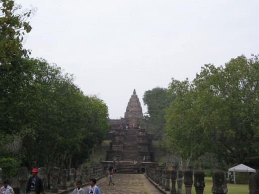 The flat pathway with columns on both sides leading to one of the three "Naga bridges". Next, there are 52 steps leading to the top of the hill which links to the principal tower.