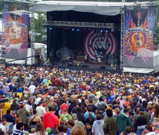 Micheal Franti on stage at Mountain Jam