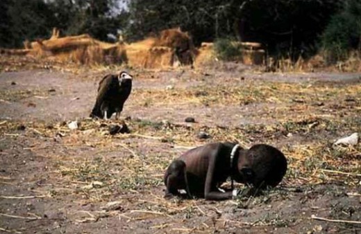 This photograph showing a vulture waiting for a starving child to die, was taken by photojournalist Kevin Carter in 1994 during the Sudan famine, won the Pulitzer Prize. That same year, Kevin Carter committed suicide.