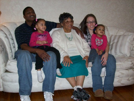Suzie with her grandson Keon and his family.