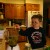 My four year old son adds garlic to the blender. My four year old son adds garlic to the blender.