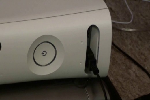 Connect the headset's USB connector to an available USB port on the Xbox 360. Alternatively, you can connect it to any nearby powered USB port.