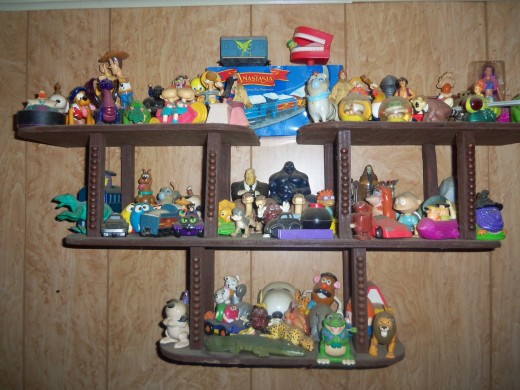 I wanted to throw this photo of a collection of Burger King & McDonald's happy meal toys in with this hub as well, since these toys were also out of their boxes.
