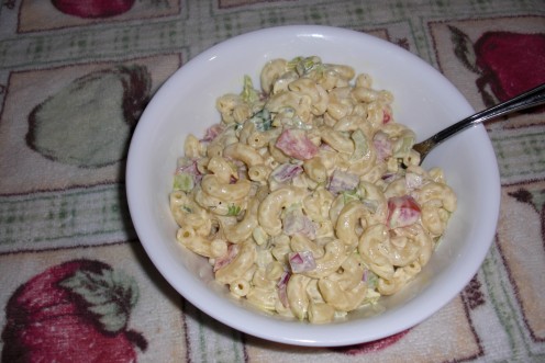Well here it is, my macaroni salad with chopped green and purple onions, celery, Roma tomatoes and dill pickles.  All wrapped in a slightly sweet and tangy dressing!  