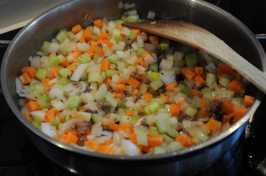 The veggies, just beginning to soften.  Don't worry if you don't remove every bit of browned meat from the pot before cooking the veggies!  It won't hurt anything.
