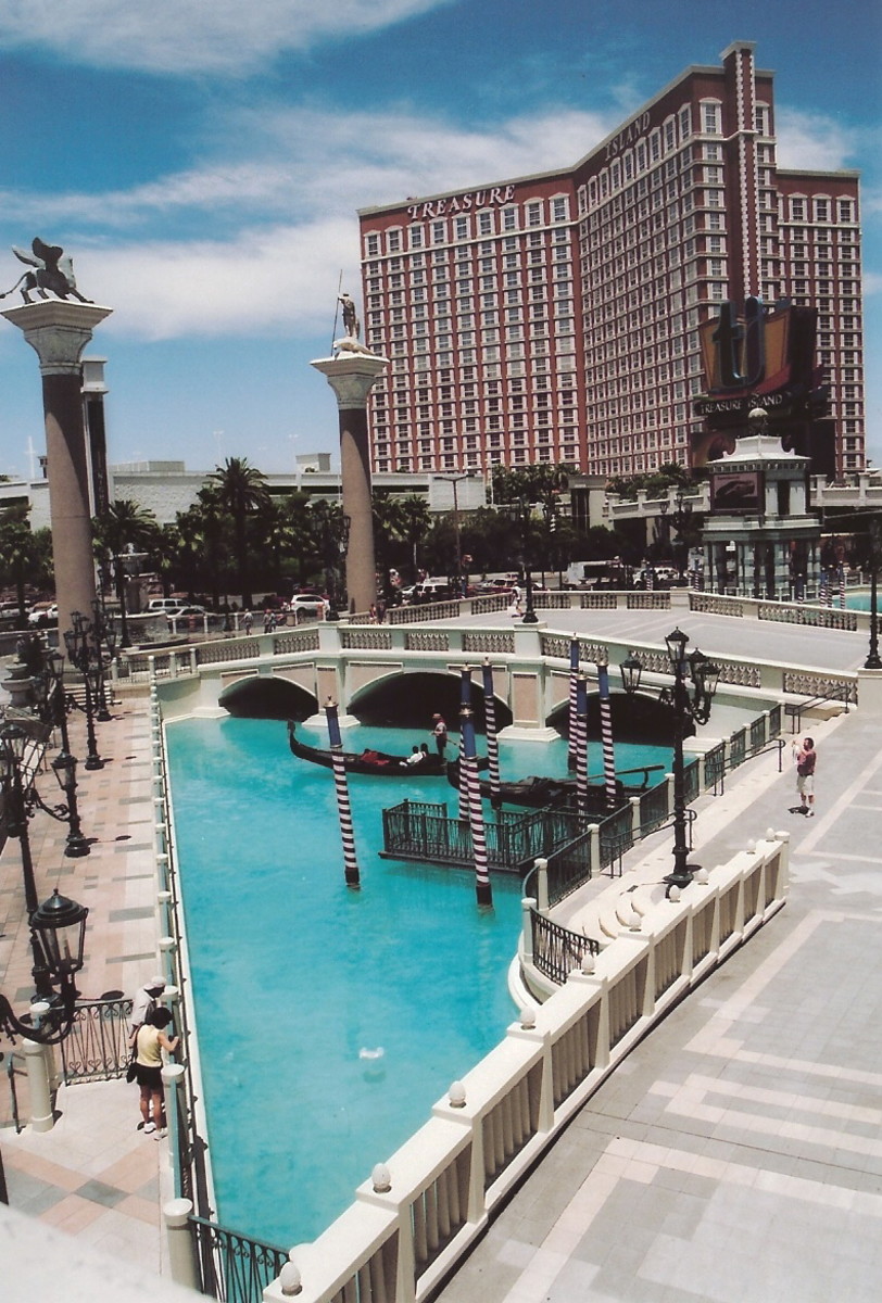 The Venetian Las Vegas Casino, Hotel & Resort with gondola in back of the waterway.
