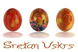 Sretan Uskrs means "Happy Easter!"  Hard cooking the eggs with onion skin and other natural dyes can give a reddish brown color.  Commercial dyes are also used. Some children paint them or add store bought stickers