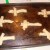 Place the finished crosses on the cookie sheet to bake.