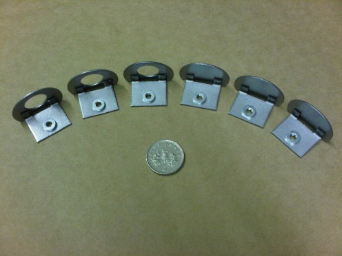 Mild steel fabricated spot welded angle bracket assemblies.  The 5 pence piece shows the smaller end of bracket work that can be achieved.