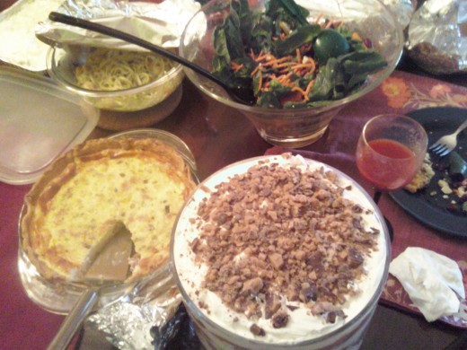 A sampling of the dishes at the Potluck- shrimp scampi, a salad, a quiche and a a trifle for dessert. 