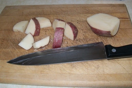 Dicing the potatoes into small cubes will help them cook faster.