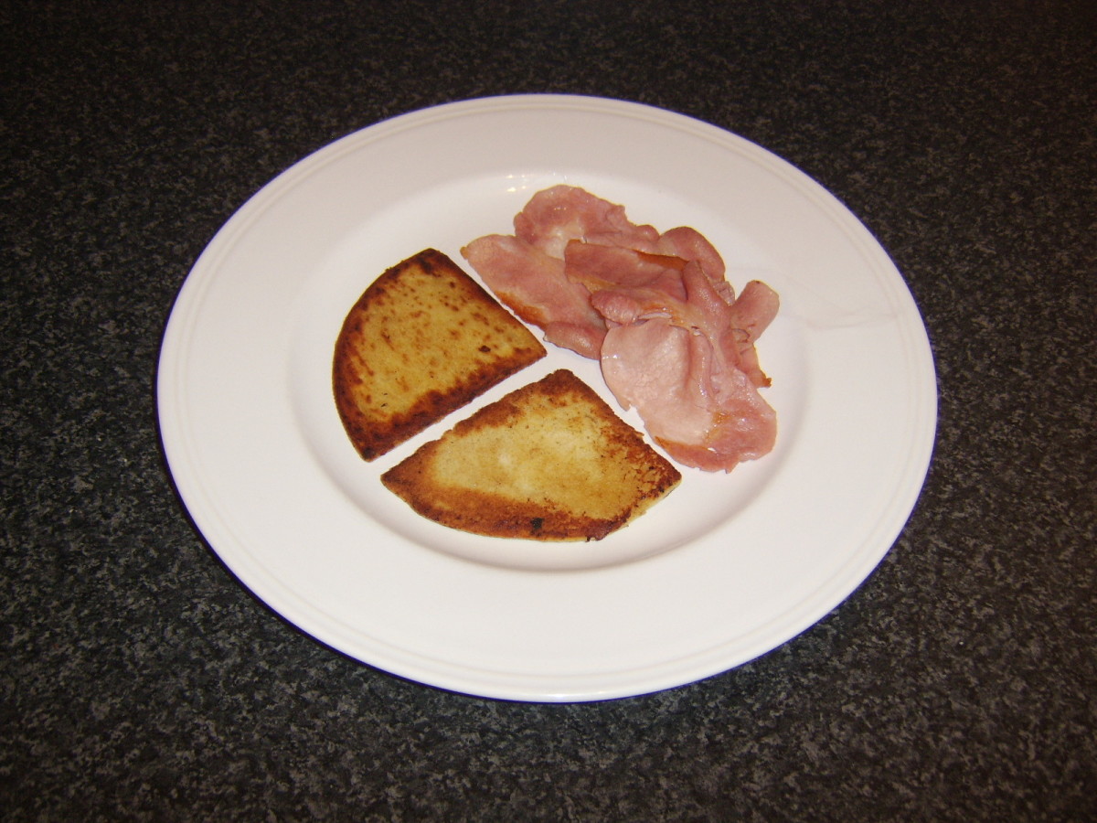 The fried breads and bacon are plated first