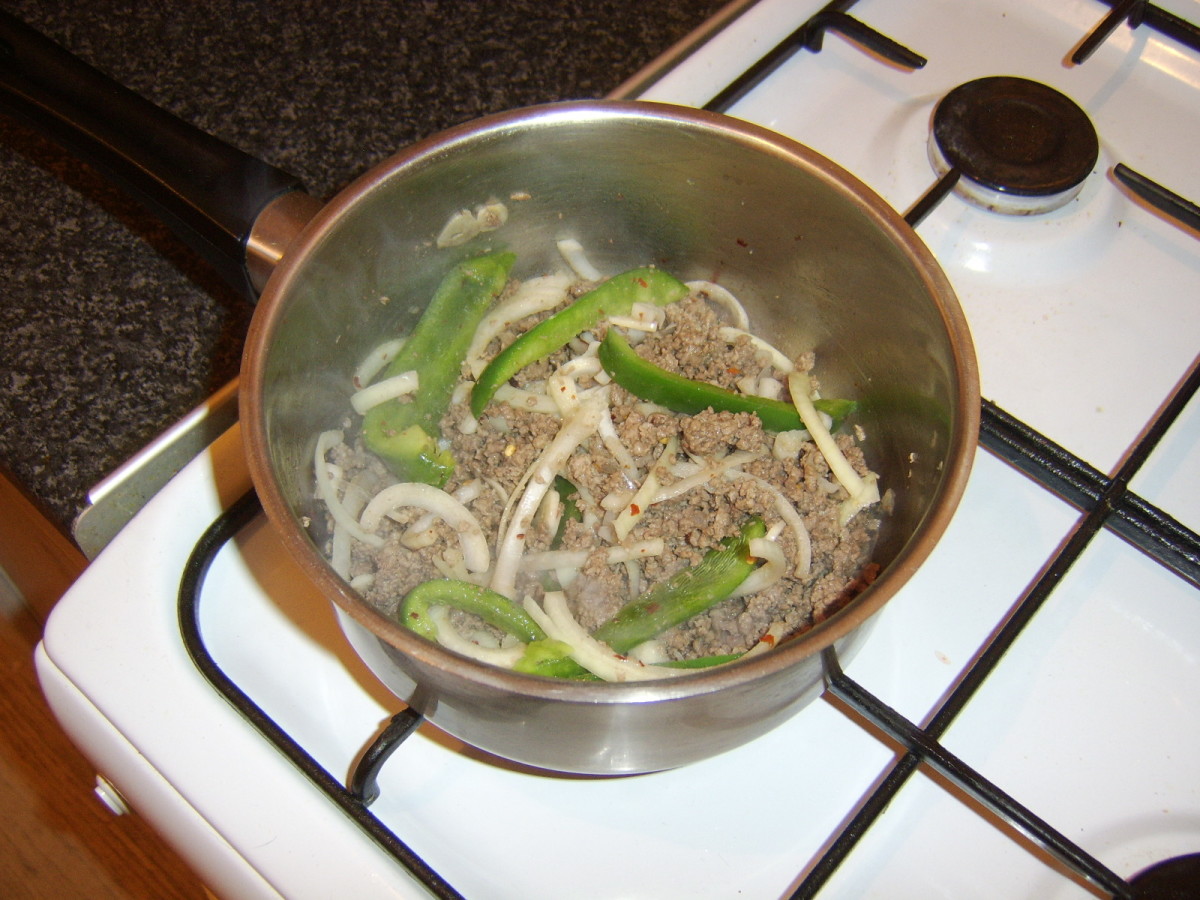 Chopped vegetables are sauteed in browned beef and juices