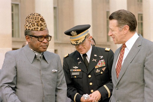 Other types of two-legged snakes who figure prominently in the background of this historical-fiction novel, Mobutu and U.S. Government officials.