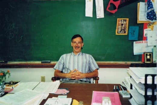 A satisfied teacher, content in the classroom.