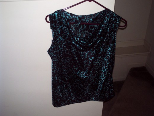 This is the bodice done and hemmed except for the sleeves.