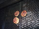 The last three burgers on the grill!