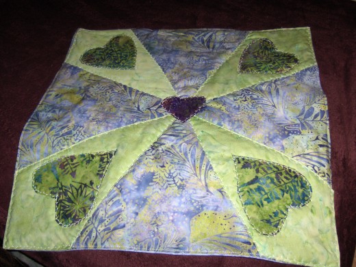 You Might then get a Different Idea as in this pillow Quillow Top.