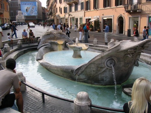Fontana della Barcaccia in the Piazza di Spagna. This fountain was believed to be the source of poet John Keats epitaph; " Here lies one whose name was writ in water"