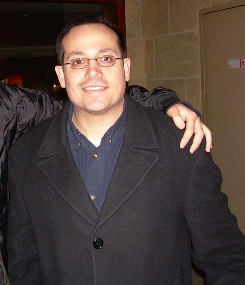 Ah, the old "cut the other person out of the photograph so you don't have to see them" thing.
