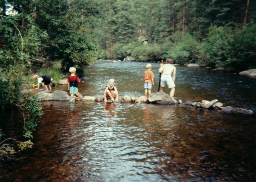 Children playing in the stream