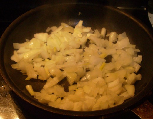 Soften plenty of onions.