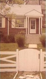 I really wanted a house with a picket fence, but in looking at what would hold the dog in and give her boundaries and still be white and pretty we settled for a corral fence.