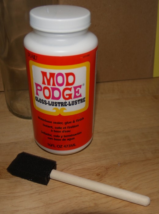 Mod Podge® and Foam Brush. Mod Podge® is a waterbased sealer, glue, and finish. It's available in both gloss and matte varieties. The foam brushes are inexpensive and disposable.