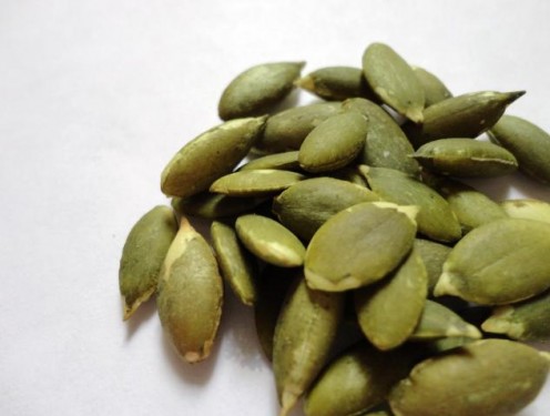 Roasted pumpkin seeds are safe for your dog's consumption and make great treats.