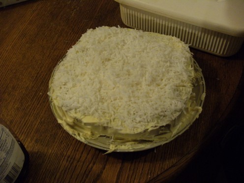 My 03/2012 Birthday cake. Coconut Cake. My hubby made it, with a little supervision from me. This was his first cake he ever made. I was so proud of him ^_^