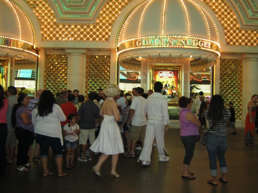 "Elvis" and "Marilyn" walking together down the street... only on Fremont Street in Las Vegas.