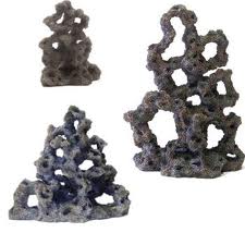 If your hole fettish is not appeased, you can get something like this. Many different shapes and sizes. I would get the ones that are made out of the sandy looking material. But these resin ones are just as good.