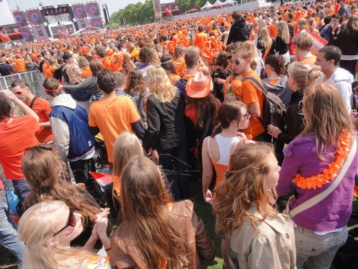 Nearly every person on Earth has an ego which is too often easily bruised. A crowd of people celebrating Queensday in Amsterdam by wearing orange.