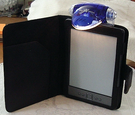 Reading Light attached to the Kindle