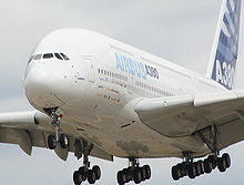Airbus 380 landing with multi bogey L.Gs extended.