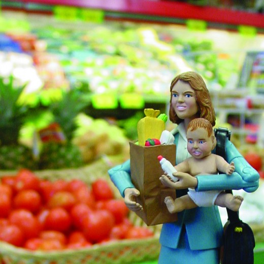 A professional career person going grocery shopping, taking care of the baby after work.