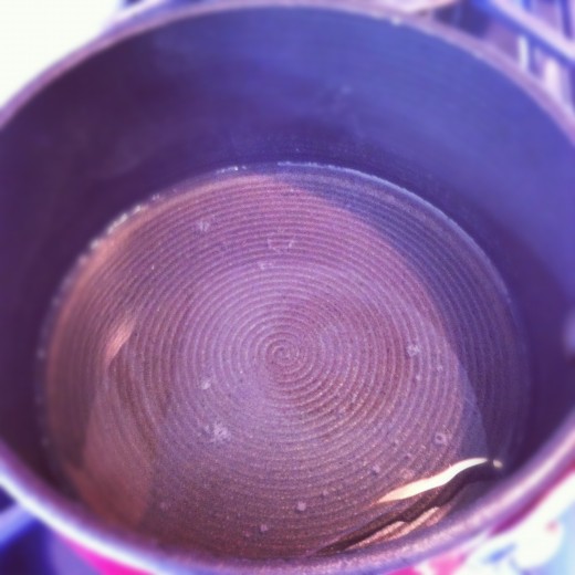 Heat the gelatin and water over low heat. The gelatin is fully dissolved when the mixture turns clear.