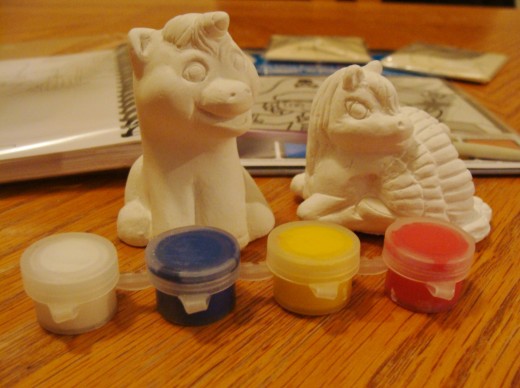 These two plaster statues came in a package together for $1.00.