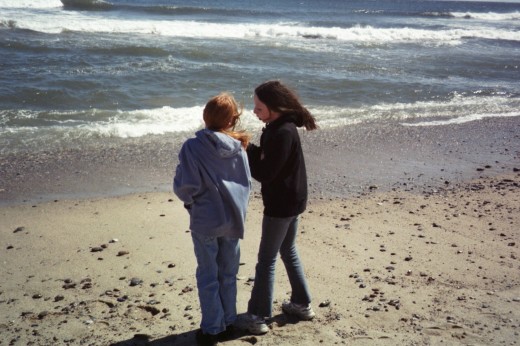 People Photo of my daughters on the beach when they were much younger...and did not always get along! This is a nice memory of a day they were close.