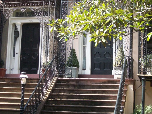 This home built for two sisters who sat on the porch and argued about which one would get which house.